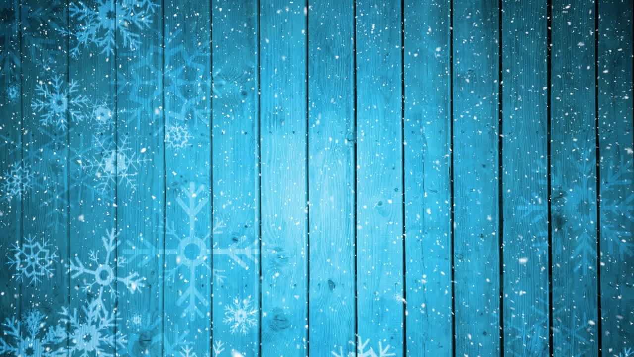 Snø som faller på blå bakgrunn