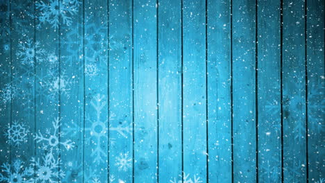 nieve cayendo sobre un fondo azul