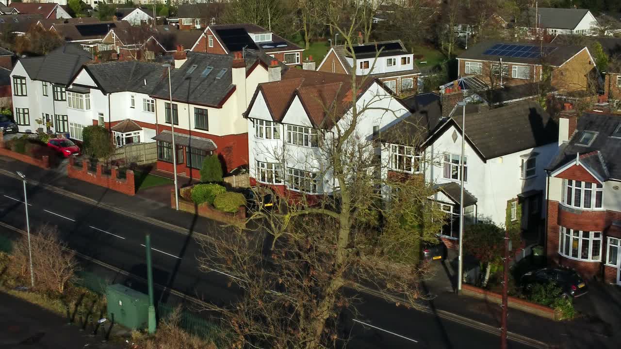 Aerial view expensive British middle class homes in rural suburban neighbourhood