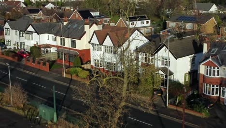 aerial view expensive british middle class homes in rural suburban neighbourhood