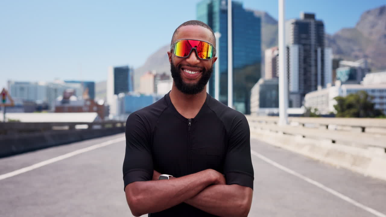 Confident Black Man in Sportswear and Sunglasses on City Road