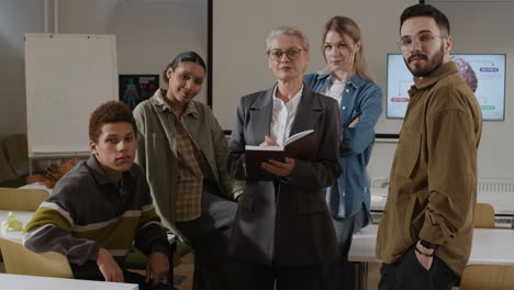 a group of students and a teacher in a classroom