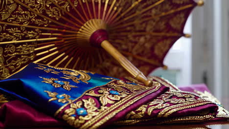 traditional indian clothing and decorative umbrella