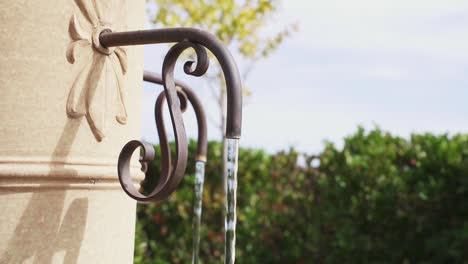 water continuously falling from water fountain at barossa valley in adelaide, south australia