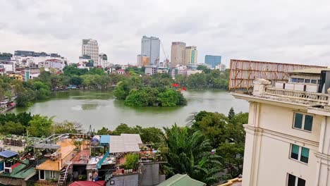 panoramic view of hanoi's urban landscape and lake