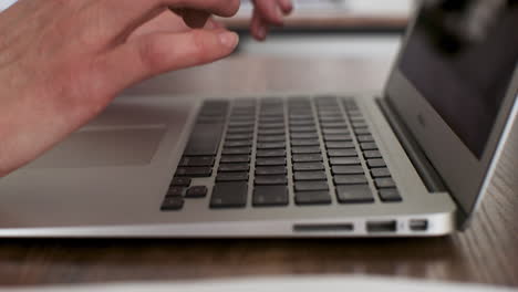 student using computer in classroom