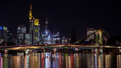 frankfurt skyline with river at night