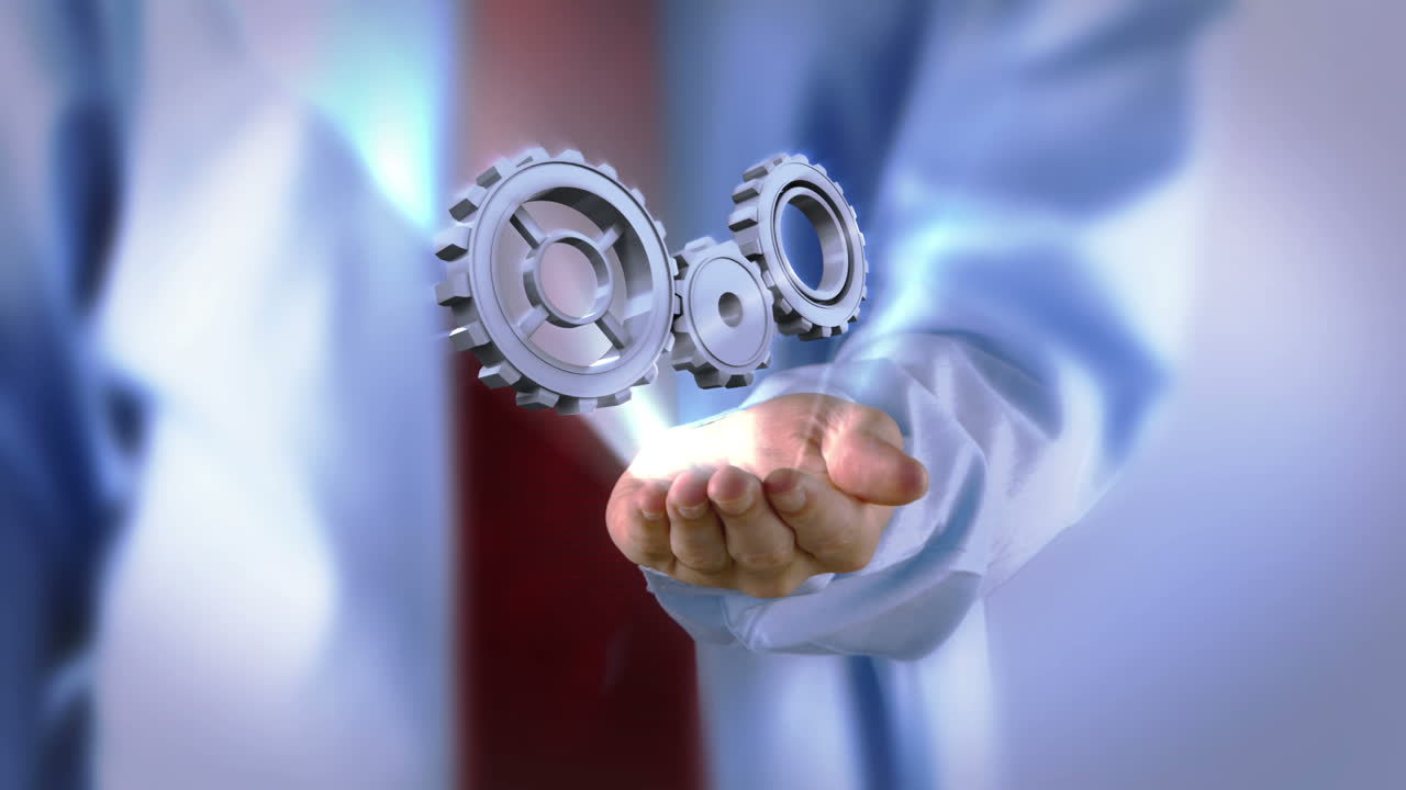 бизнесмен, представляющий зубчатые колеса и колеса