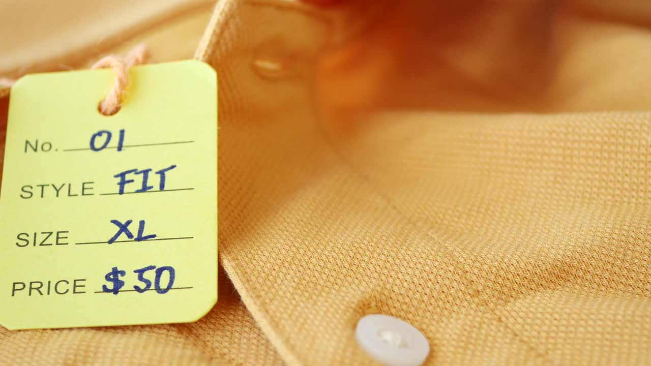 Yellow Polo Shirt with a Tag