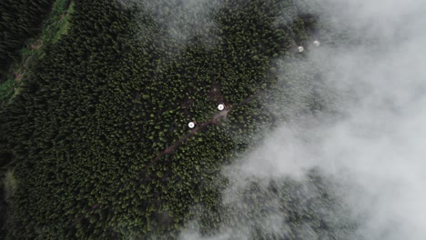 Yurts-in-the-mountains-with-clouds-rolling-over