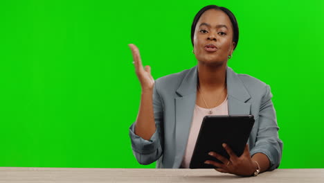 Black-woman,-talking-and-reading-tablet-on-green