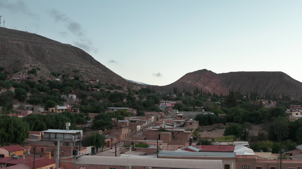 Aerial - Small town of Tilcara in Jujuy, Argentina, wide lowering shot