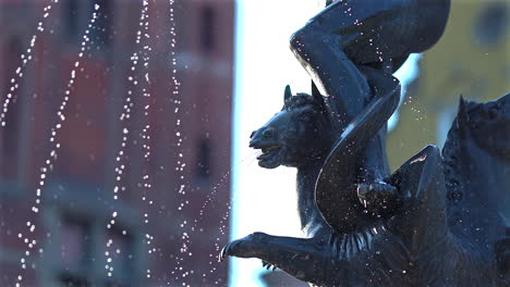 close up shot of neptune statue in the old town of gdansk, poland