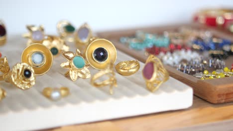 gold and gemstone rings display