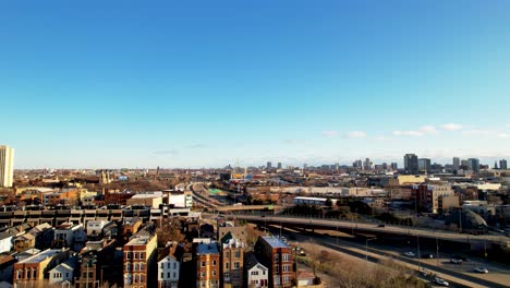 city neighborhood next to expressway aerial timelapse