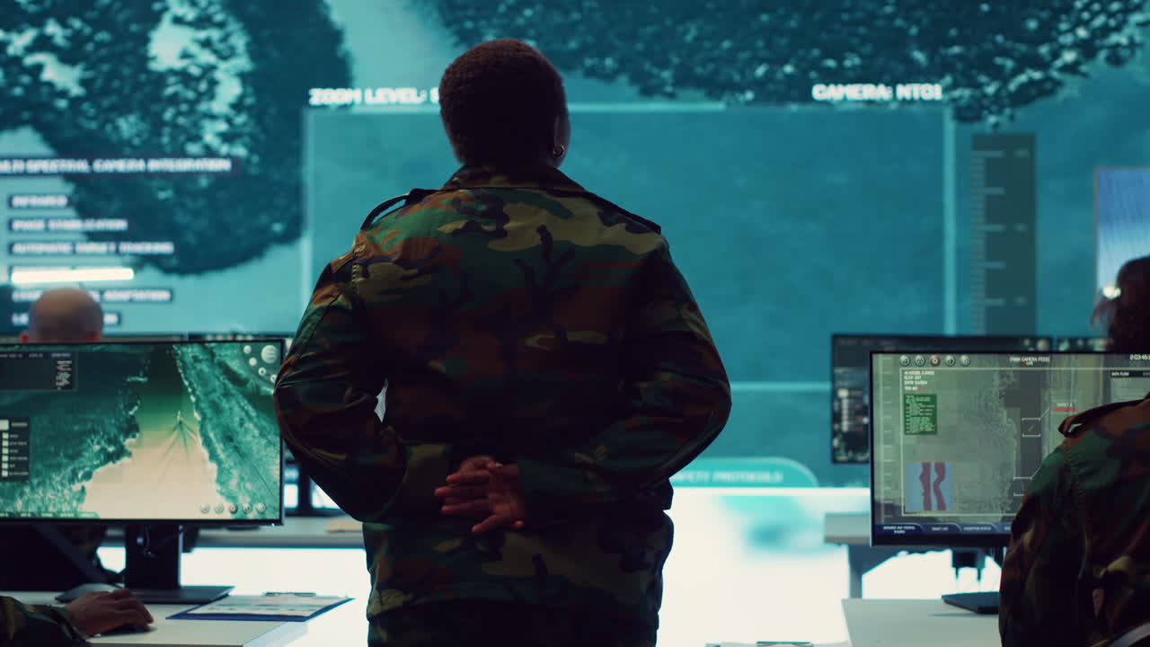 Woman army officer coordinating special operations mission in command post