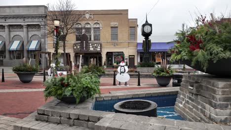 christmas decorations in downtown northville, michigan with drone video moving sideways