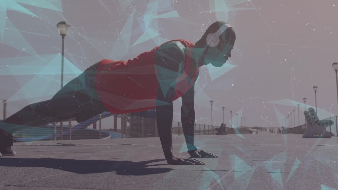 해변에서 운동하는 아프리카계 미국인 남성 위에 움직이는 모양의 애니메이션