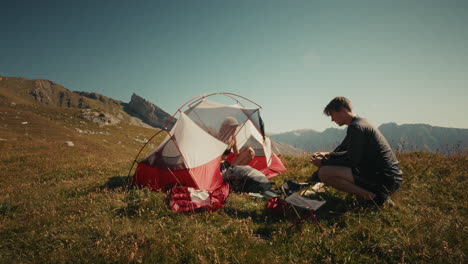 couple camping in the mountains