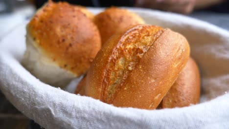 freshly baked dinner rolls in a basket