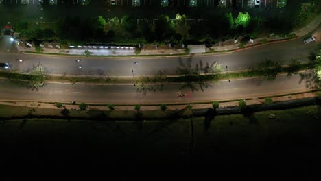 aerial view of night city road and parking lot