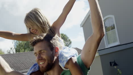 father having fun with his daughter