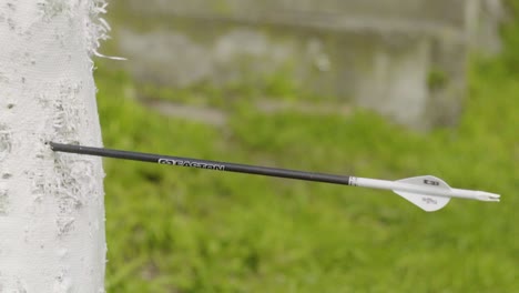 A-side-view-of-an-arrow-being-shot-into-an-archery-bag-in-slow-motion