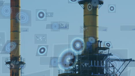 animation of scopes scanning and data processing on screens over factory chimneys