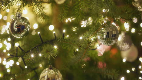 glow of christmas lights on beautifully decorated christmas tree