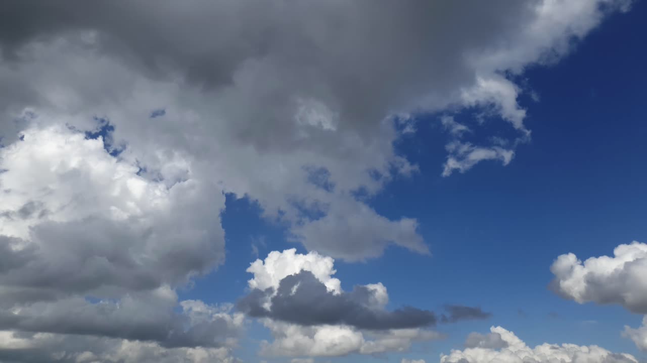 Dynamic Cloudscape with Blue Sky