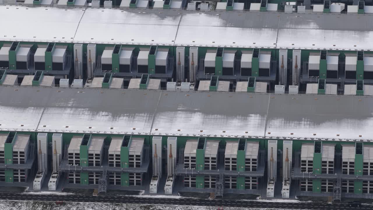 Aerial drone close up views of data center emergency power backup systems and HVAC cooling infrastructure in the Netherlands, highlighting critical energy reliability and climate control for digital o