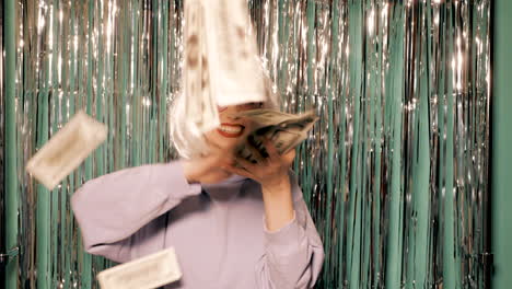 woman celebrating with money