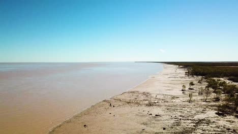 Forward-and-upward-flying-aerial-shot-of-tidal-mudflats-in-King-Sound,-Australia-where-the-second-largest-tides-in-the-world-occur