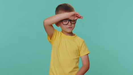 Curious-boy-kid-children-closing-eyes-with-hand-and-spying-through-fingers,-hiding-and-peeping