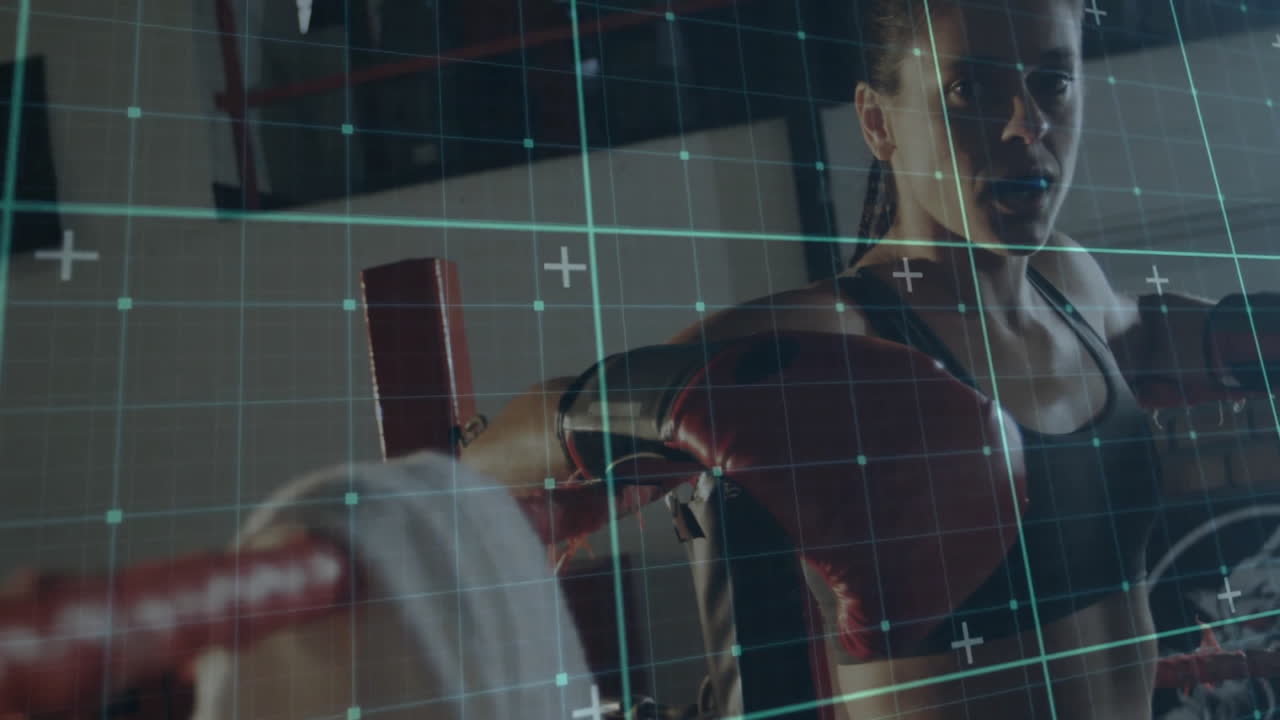 woman training inside boxing gym ring, with sports technology overlay highlighting movement metrics