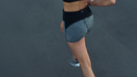 fitness, woman and legs running in street