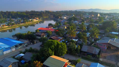 Aerial-Northern-Myanmar-Neck-Tribe-Kayan-Karenni-People-Group-Burma-Tourisim-Sunrise-Tropical-Palm-Trees