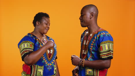 Cool-african-american-couple-greeting-with-fist-bump