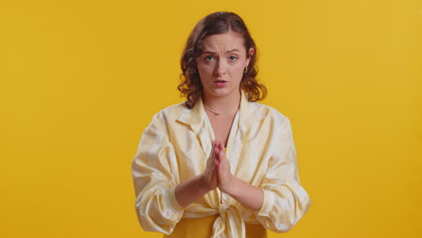 attractive woman praying looking upward making wish begging apology asking help forgive me