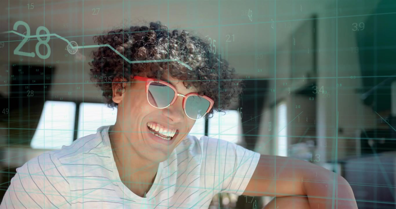 Man sitting in loft, grid overlay drifting over frame, causing turning head, laughing, showing tech