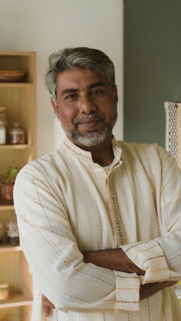 Portrait of a Smiling Middle-Aged Indian Man