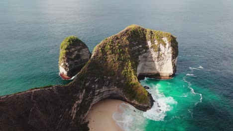 drone shot of kelingking beach, t-rex beach in nusa penida, bali, indonesia