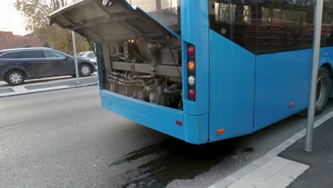 Broken-down-public-transport-bus-with-an-overheated-engine