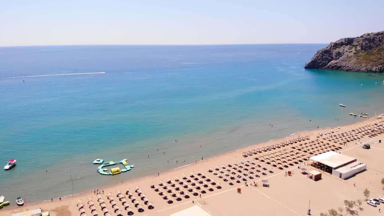 View From Above Of Tsambika Beach And Waterpark On Rhodes Island In Greece In Summer