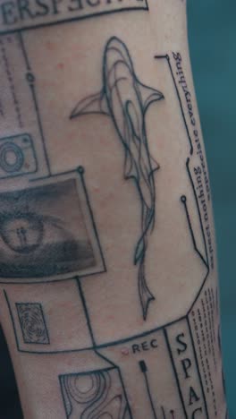 vertical close up abstract line shark, eye detail, text, camera tattoo