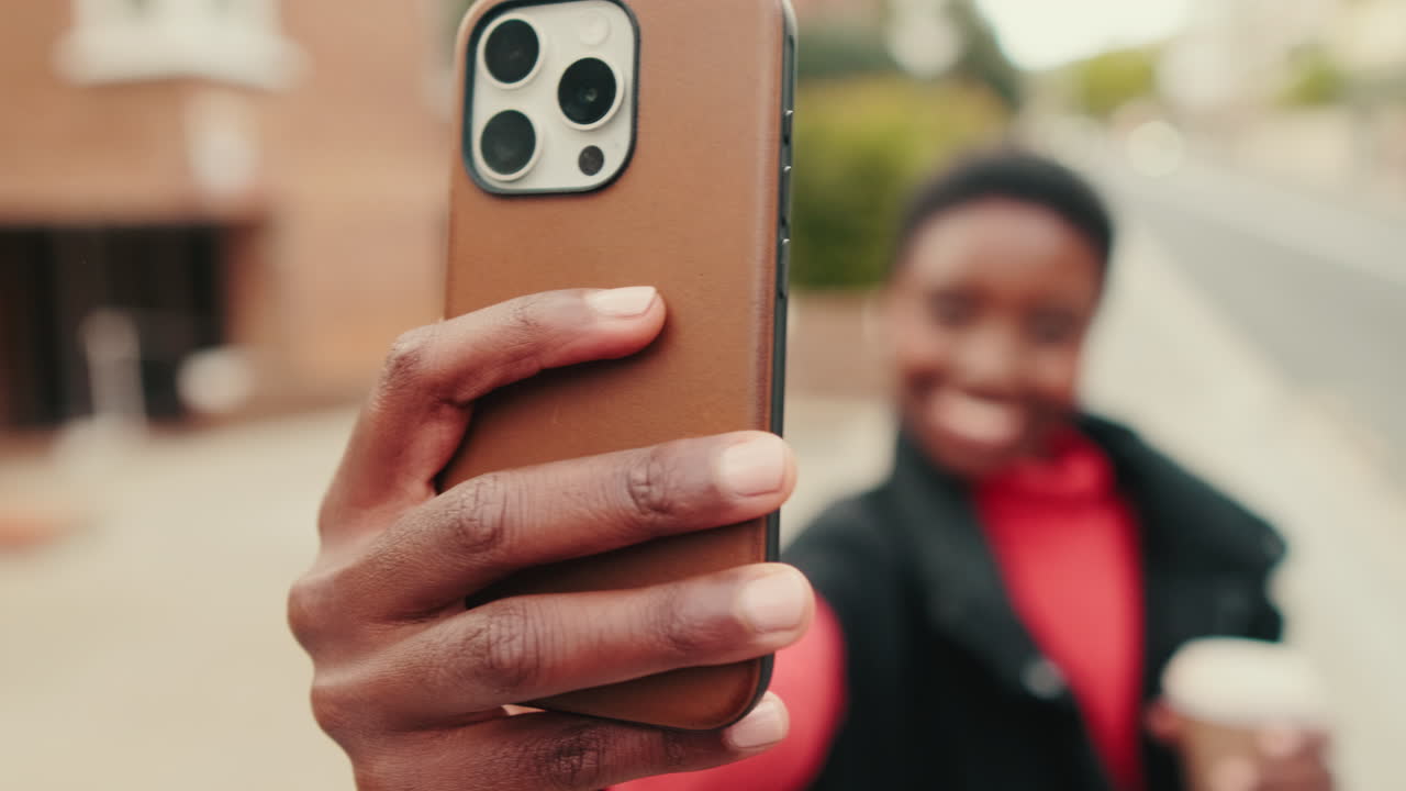 Happy African American Woman Taking a Selfie with Smartphone