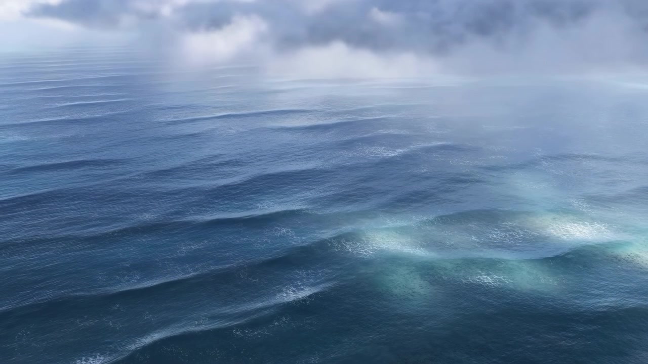 Šikmý pohled shora na otevřený oceán ukazující klidný zvlněný povrch, diagonální vlnové pásy, nízkou mlhu a vzdálený horizont pod bledě šedými zataženými mraky, s jemným náladovým světlem a širokou atmosférickou scénou.