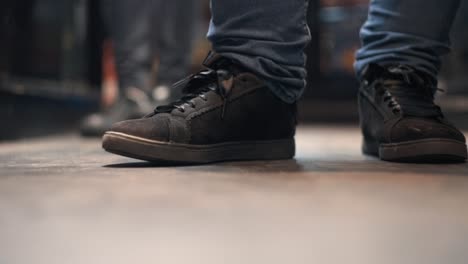 bartender taping foot on beat in a bar