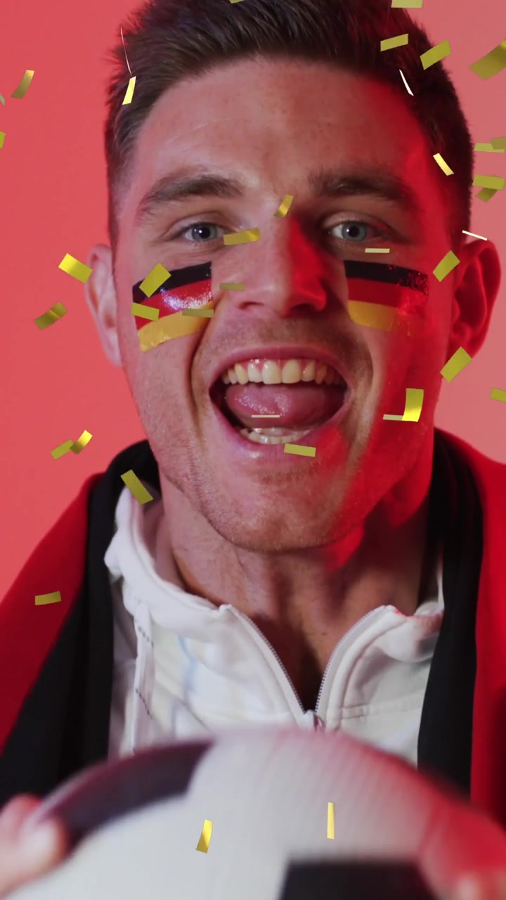 Animation of caucasian male supporter with flag of germany over confetti