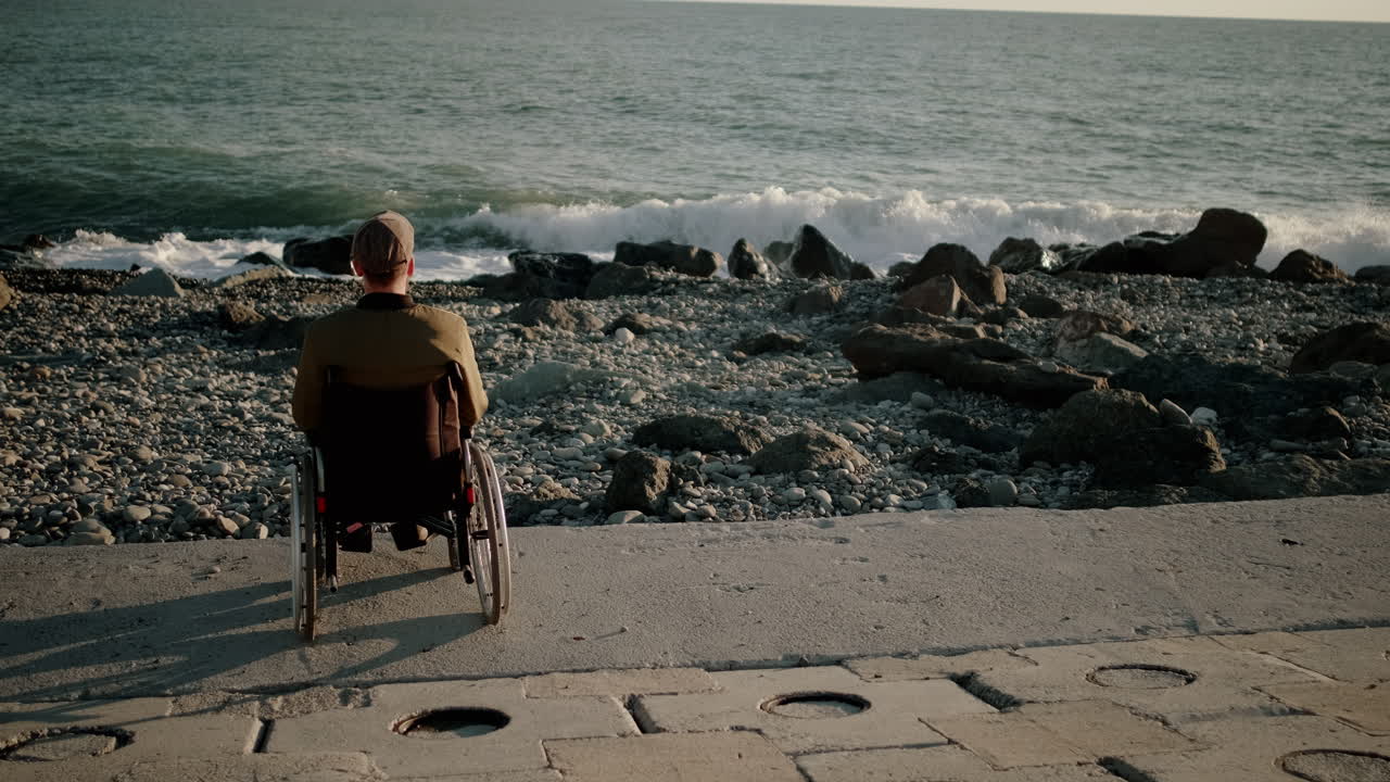 Man in Wheelchair at the Beach